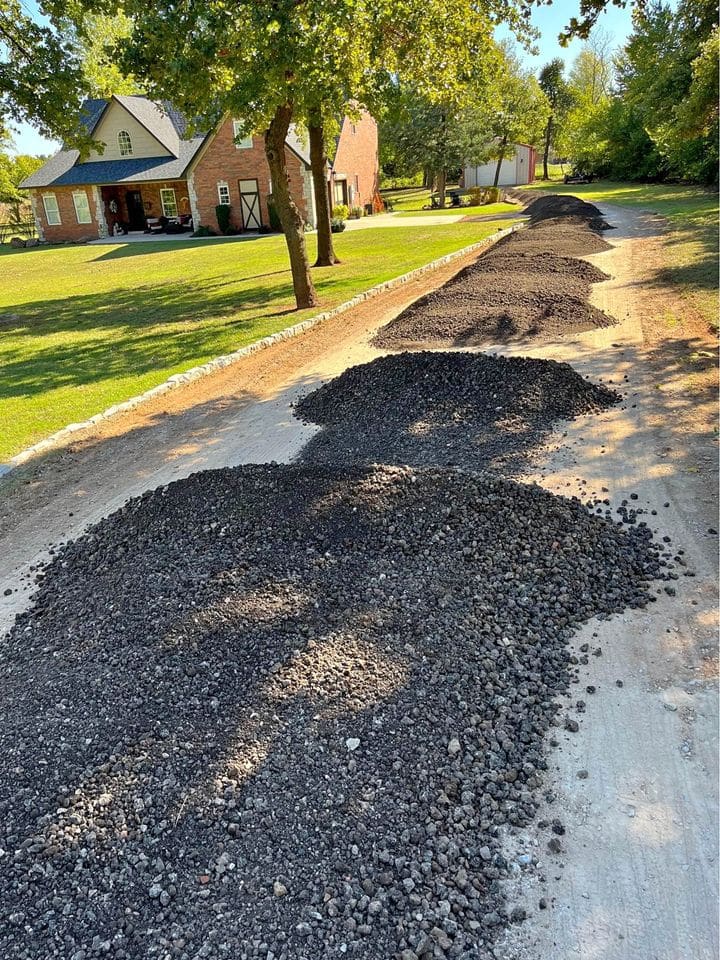Asphalt millings spread along a residential driveway